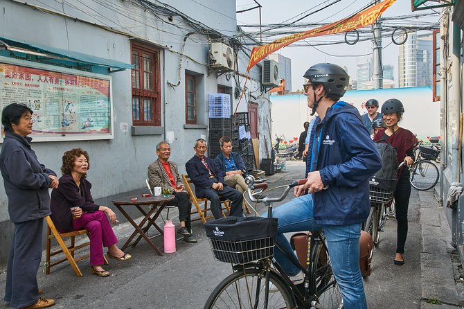 Half-Day Bike Tour of Shanghai Old Town With Food Tasting - Indulge in the Flavors of Shanghais Traditional Wet Market